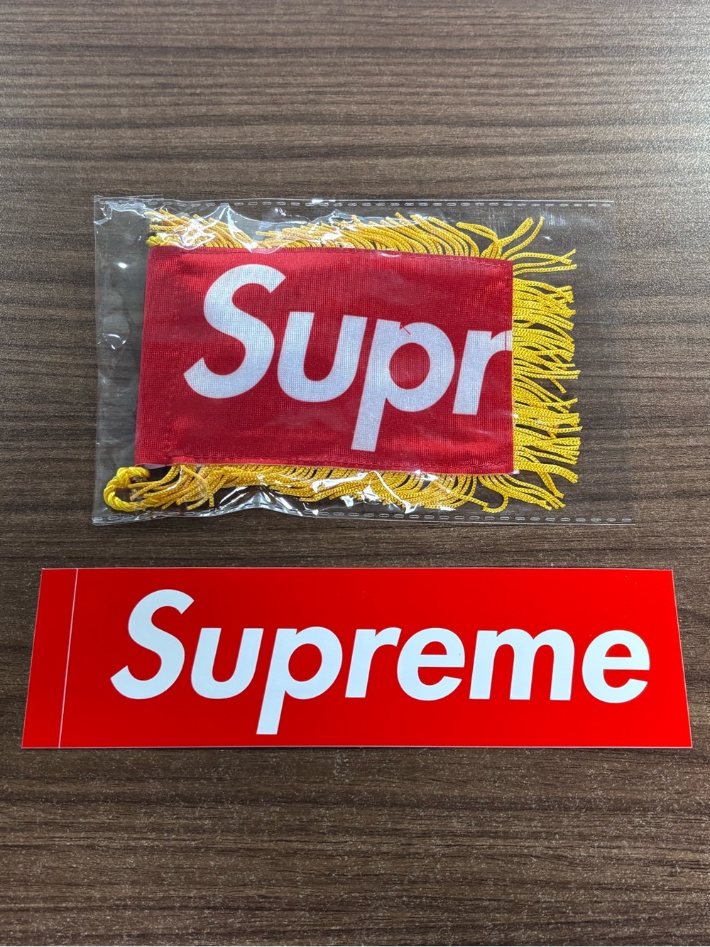 Supreme Red Banner with Yellow Fringe and White Logo